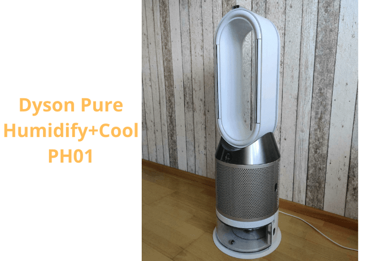 The Dyson Pure Humidify+Cool air purifier, fan and humidifier stands on the floor in front of a wall.